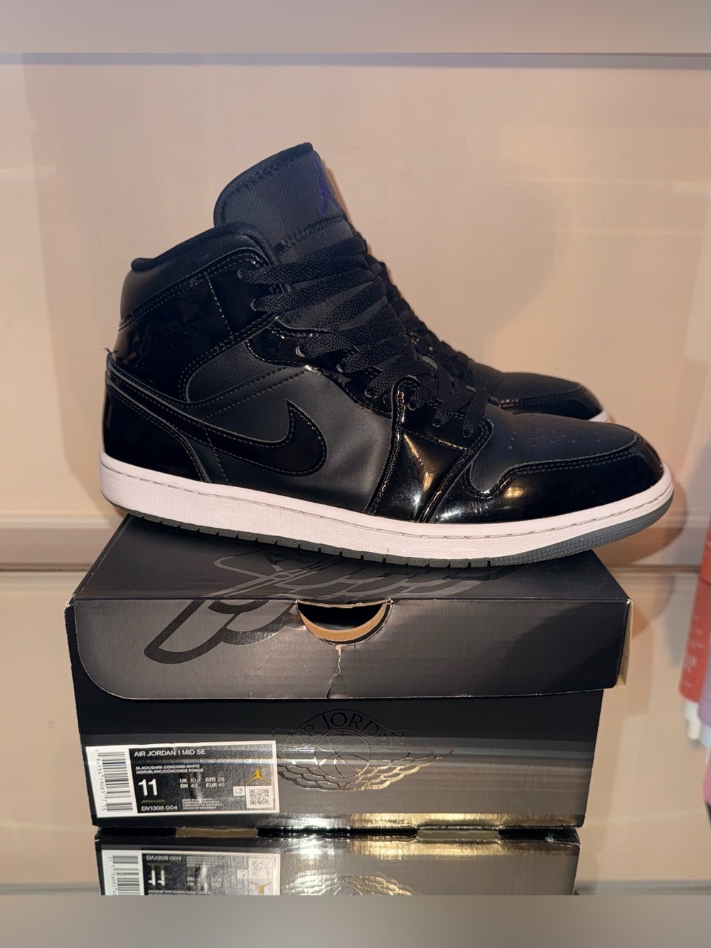 1 MID SE Jordan Men's Black Patent High-Top Sneakers with White Midsole